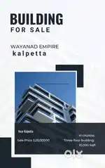 Spacious three-storey building up for sale near Kalpatta.