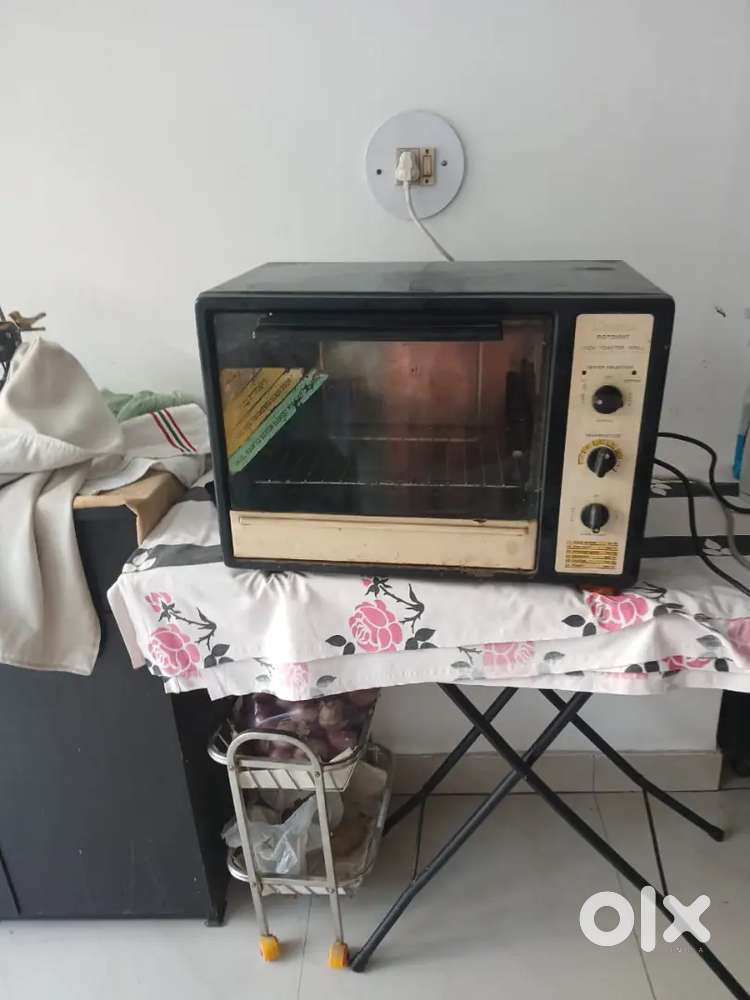 and of black  color Life time OTG 30 litres in working  condition