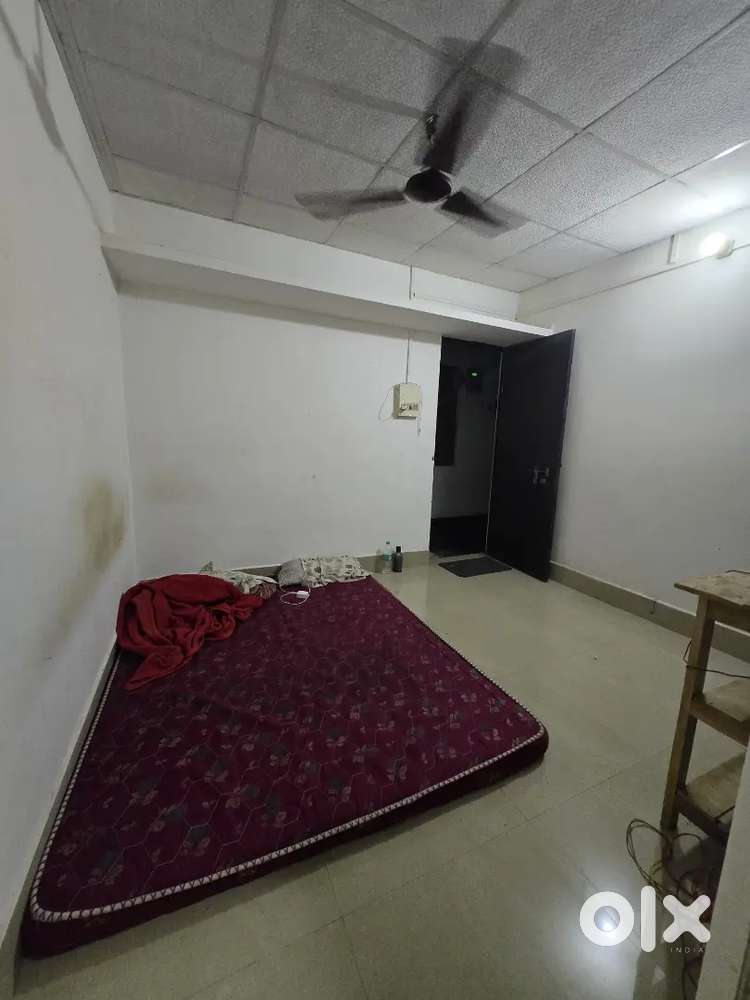 Single room with attached kitchen and bathroom
