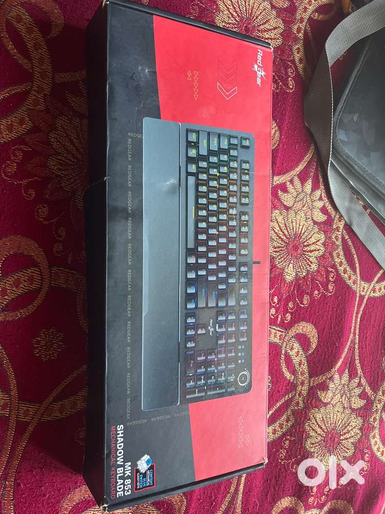 Red Gear mechanical keyboard with blue switches