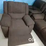 Recliner Sofa A neat fabric upholstered sofa developed using advanced