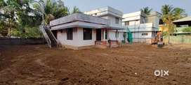 6 cent 2 bhk old house Manjummel 4 MTR road.Land cost only.
