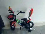 Kids bike with supporters
