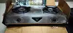 Butterfly 2 burner gas stove with food condition.