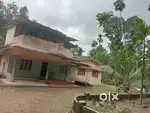 Two storied house with two acre land
