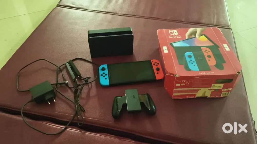 NINTENDO SWITCH OLED BRAND NEW WITH SPORTS