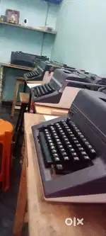 Typewriting machines with table and stool