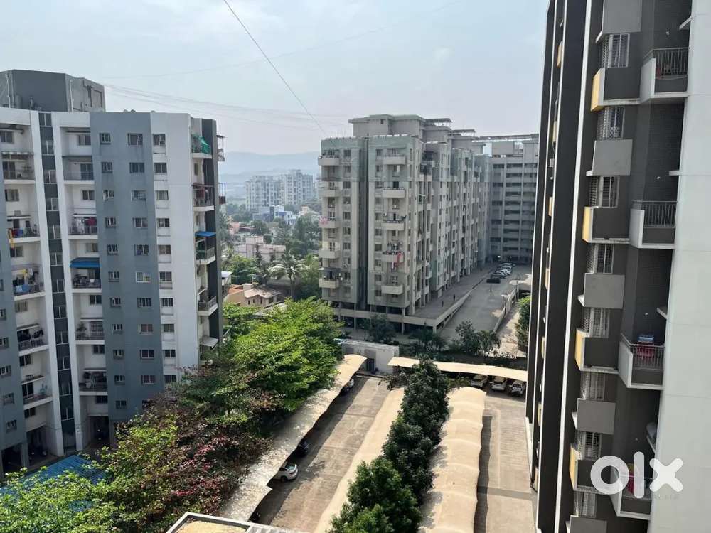 Pisoli main road 2bhk in sarthak Beaulieu for sale 45lac