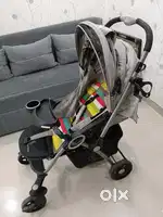 Stroller/Pram with car seat in good condition.