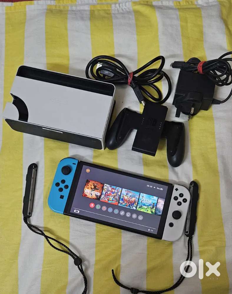 Nintendo switch OLED box peiece with 9 games