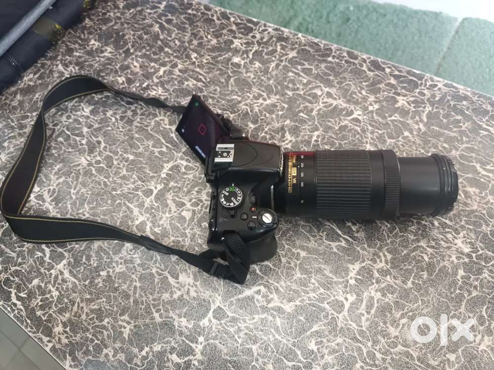 Nikon D5100 sale quality is good condition is good battery new lens