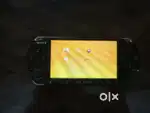 Black Sony  PSP  3000 (Playstation portable) with games &  charger.