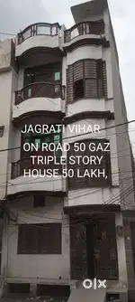 (JAGRATI VIHAR) 50 GAZ ON ROAD TRIPLE STORY HOUSE ONLY IN 50 LAKH