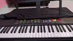Yamaha Psr-F52 Portable keyboard with 61 keys + True Cult KBR-01 Cover