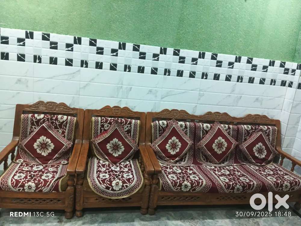 Wooden sofa set: 1 three-seater + 2 single seaters, good condition.