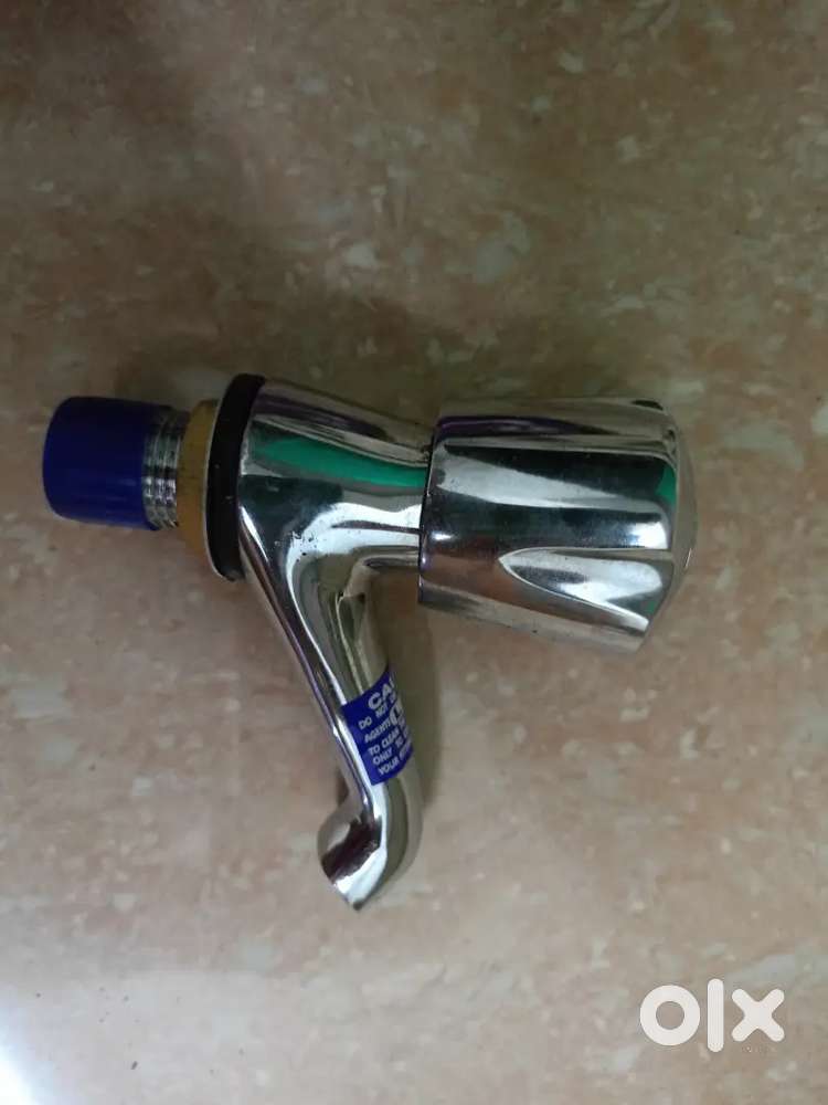 Washing machine tap, washing basin tap