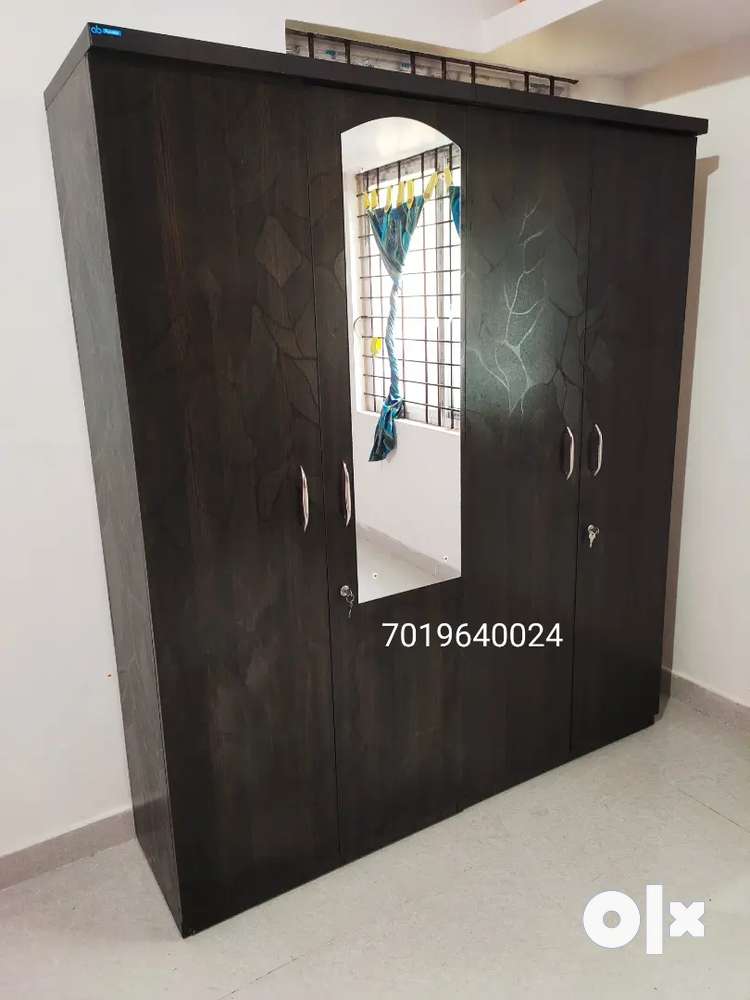 4 doors wardrobe brand new with mirror only 9499