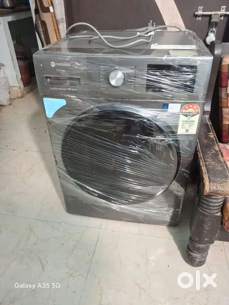 1 year old Motorola front load 10.5 kg full automatic washing machine