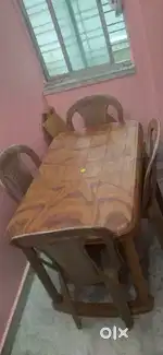 four seater dining table and four chair set