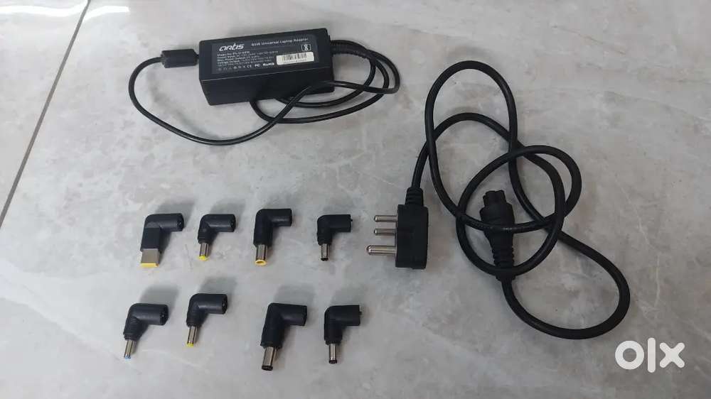 65W Universal Laptop Adapter with 8 inter-changeable connector pins.