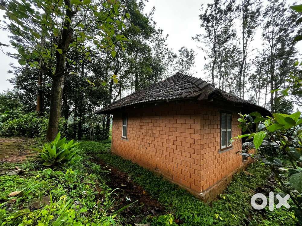 7 CENT LAND WITH A HOUSE FOR SALE IN A COLDY AREA WITH STUNNING VIEW