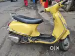 Vespa 125 yellow