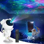 Astronaut light projector Full of lights in room