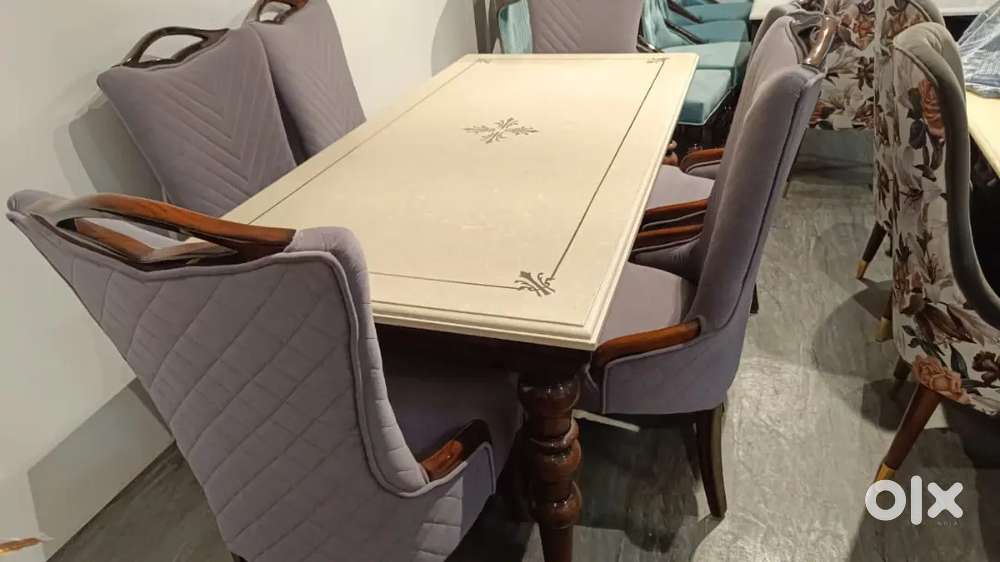 Dinning table chairs available in Starf Furniture