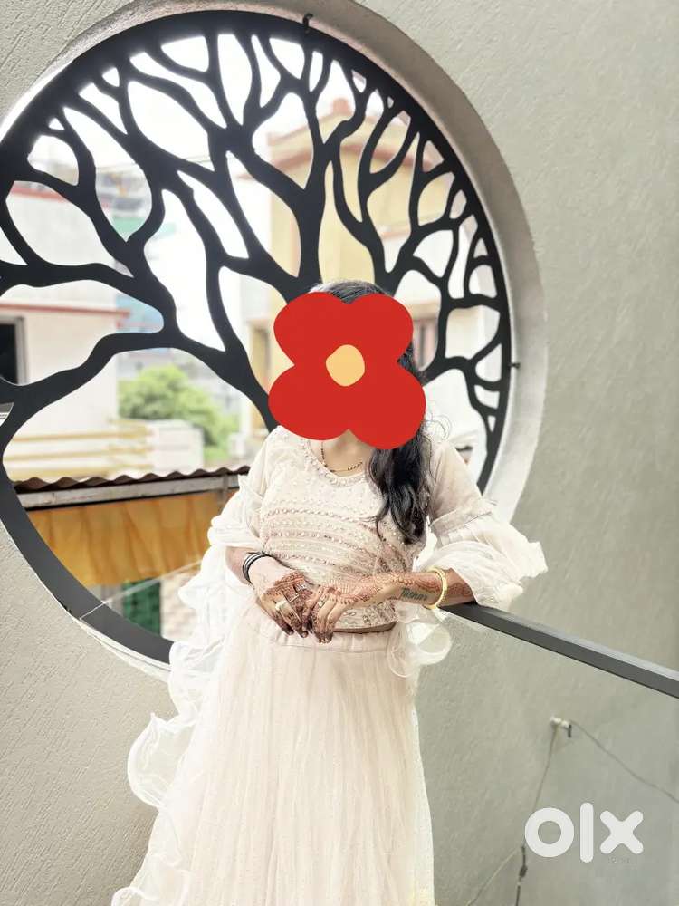 White embellished lehenga with reffled dupatta,