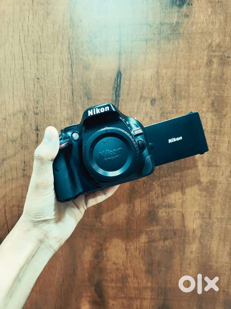 Nikon D5200 with dual kit lens, 35mm prime less & accessories