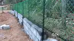 Fencing contractor- Slab wall ,chain link and barbed wire fence