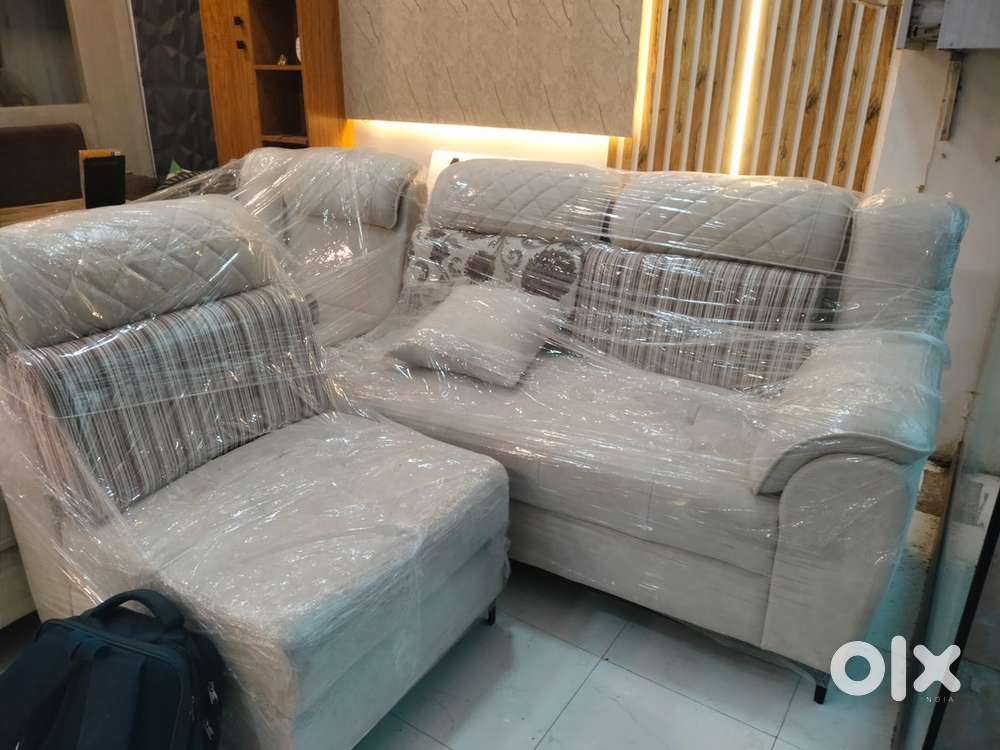 Lavish cream white L shaped sofa