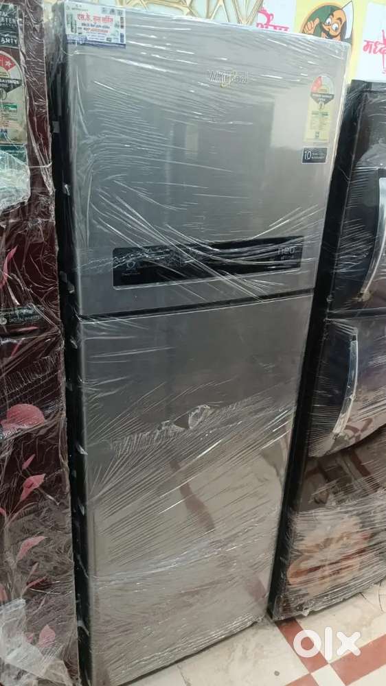 Whirlpool double door fridge good condition with warranty 1 year old