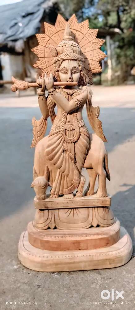 Wooden lord Krishna murti