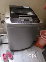 एल जी टॉप लोडिंग वाशिंग मशीन