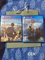 God of war and watch dogs2 ps4 CDs for sale excellent condition