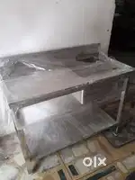 TWO WEEKS OLD UNUSED COMMERCIAL TABLE WITH SINK UNUSED