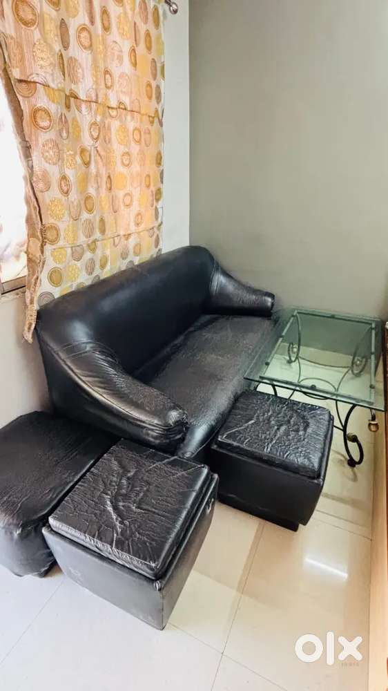 Complete sofa set with center table- Good condition & comfortab