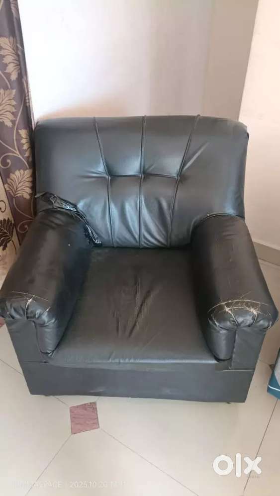 Used fridge and single sheeter sofa