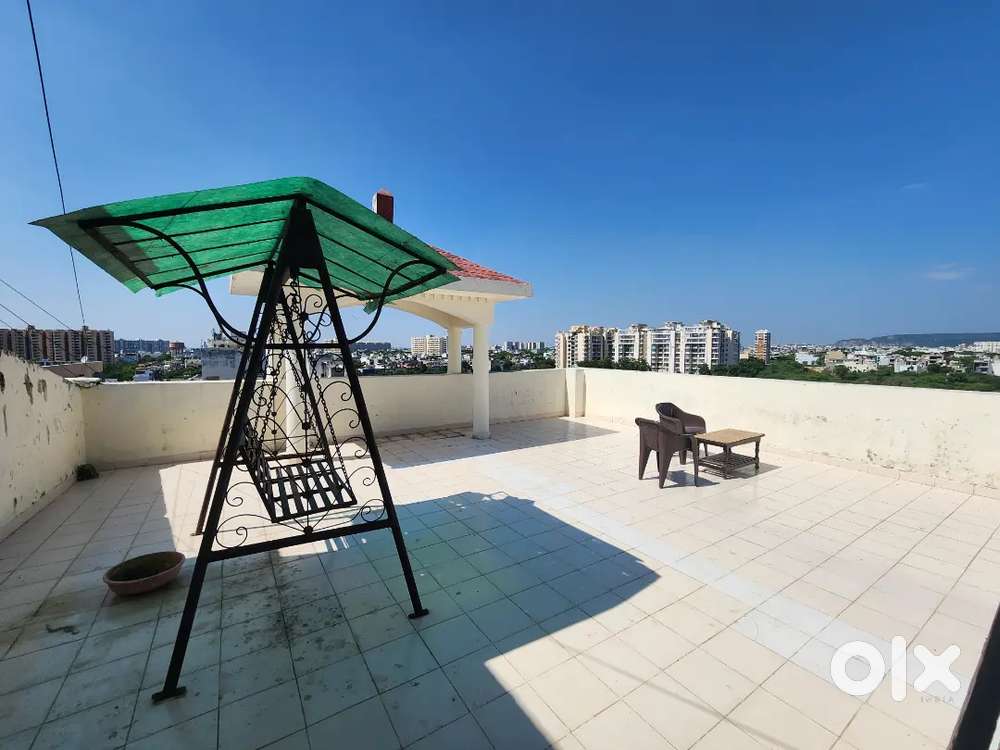 Renting a flat of 2bhk having 4 balcony and private roof