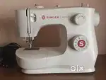 Sewing Machine in very good condition,gifted and unused
