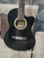 Accostic guitar good working condition new string installed