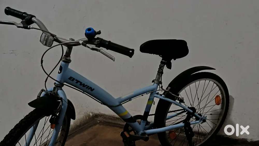 Bicycle with additional seat cover,stand, mudguard,bell and helmet