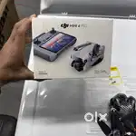 DJI Mini 4 Pro Camera Drone (with RC 2 Remote)Drone and remote