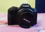 Canon eos R100 mirrorless with 18-45mm lens