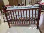WOODEN COT WITH SWING
