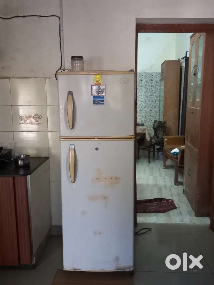 LG FRIDGE UP FOR SALE AND OLD LG TV