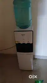 Water dispenser, chairs, fire extinguisher cylinders