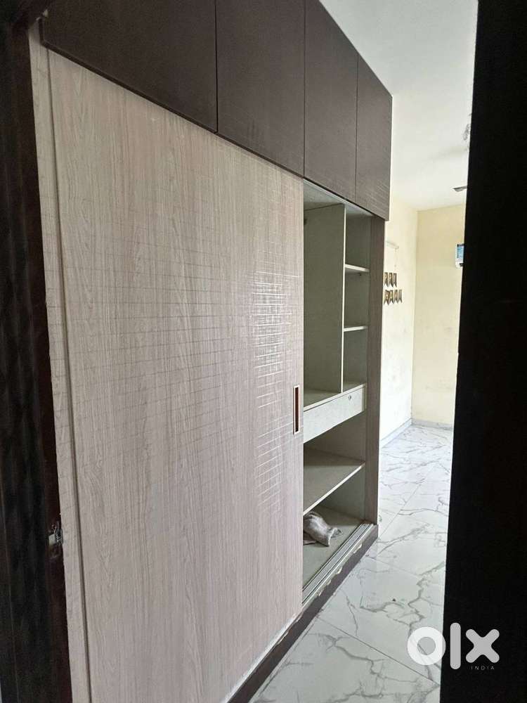 Spacious Semi-Furnished Flat with Essential Amenities