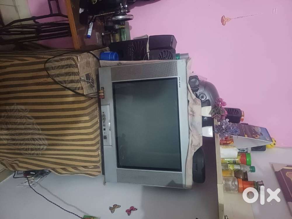 1.Samsung tv, 2.small tv, 3. cooler and 4.folding bed
